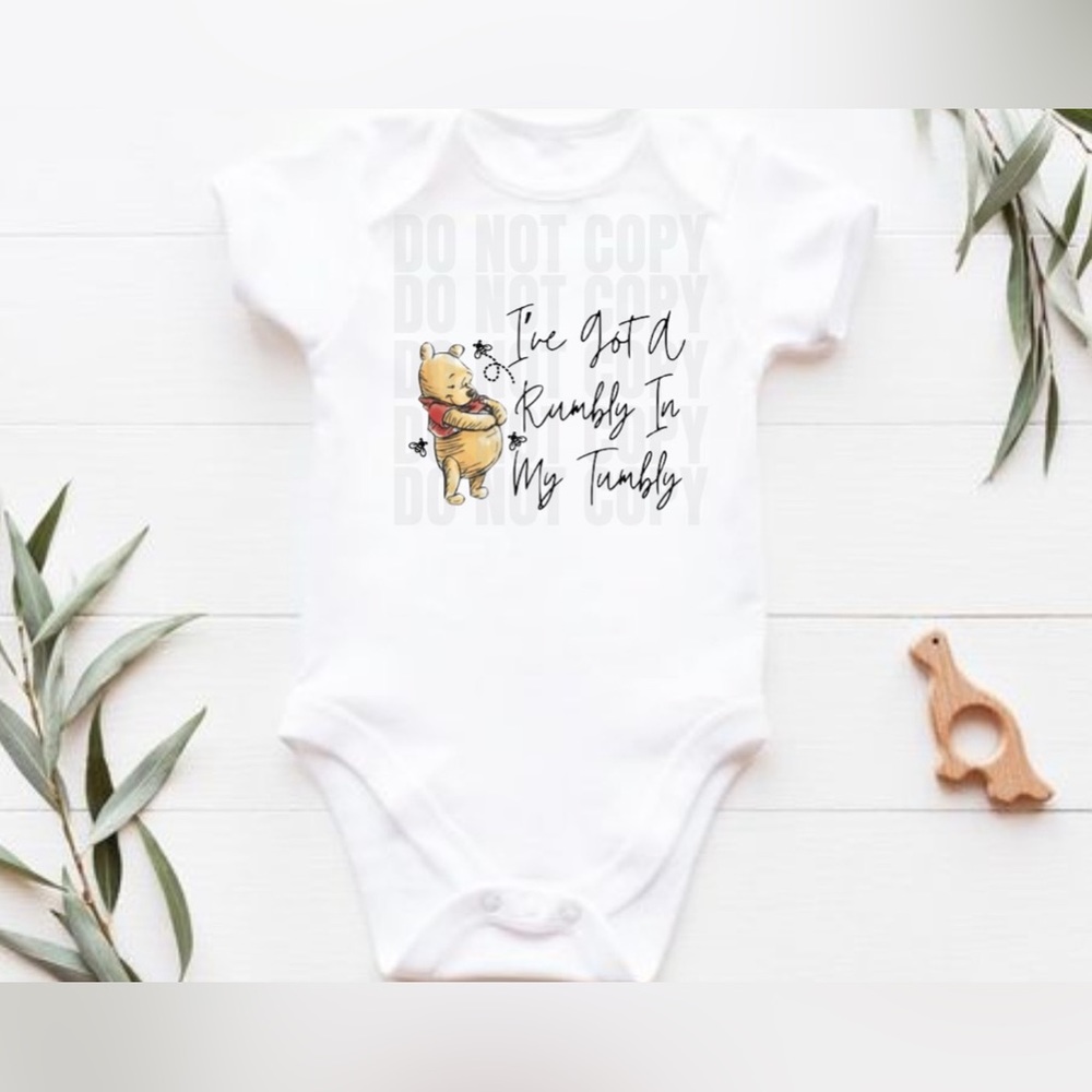 Pooh bear rumbly in my tumble baby onesie